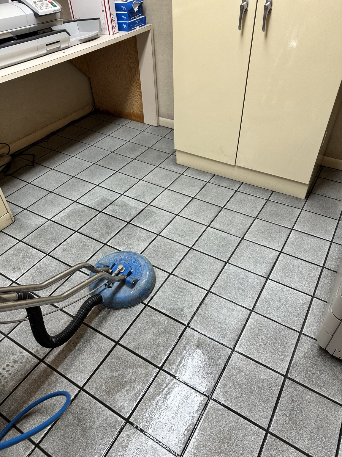 Tile floor during professional cleaning